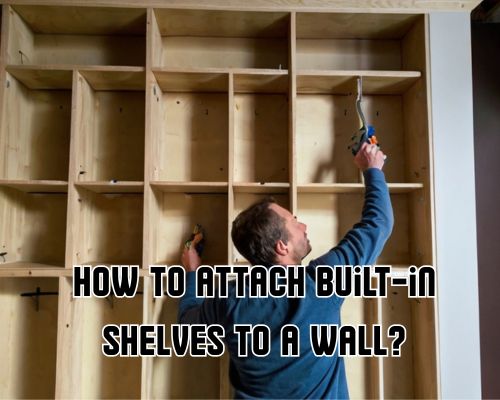 a cabinetry man working on putting bookshelf on a wall